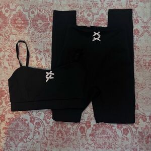 cute black activewear set with pink bows
